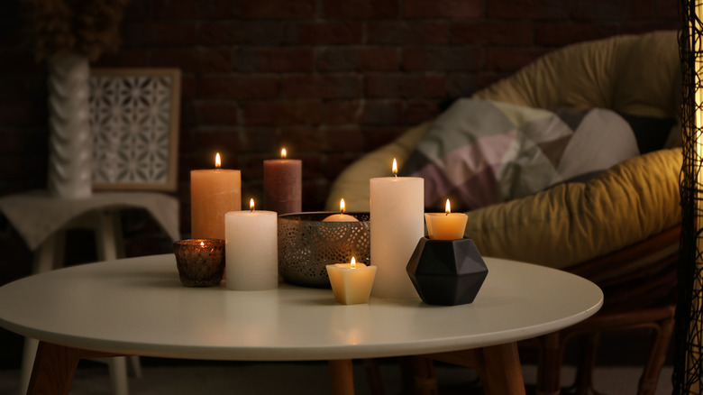 lit candles on coffee table