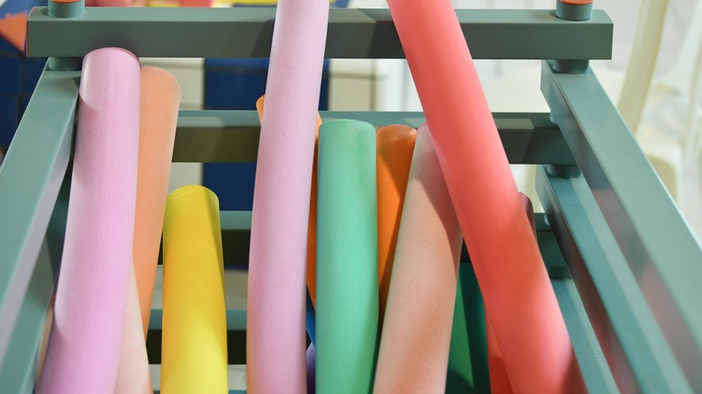 Selection of pool noodles in a crate