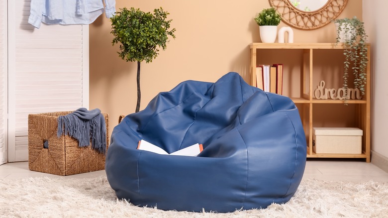 Blue bean bag on floor 