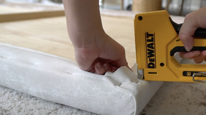 stapling upholstery to DIY headboard