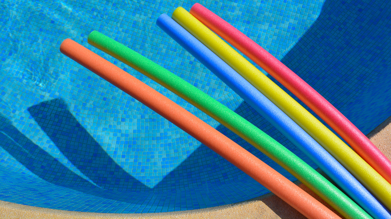 Pool noodles near the pool