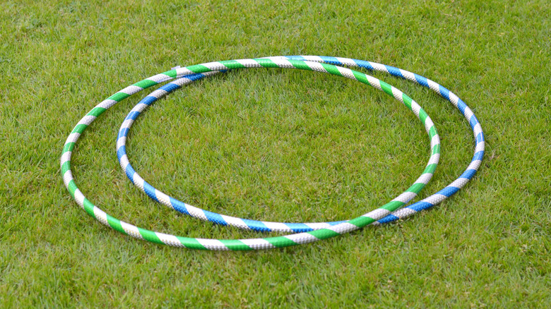 Striped hula hoops on grass