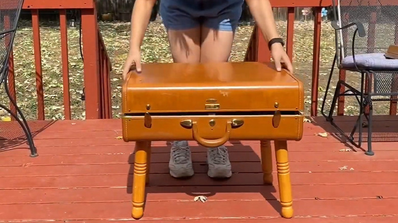 A suitcase side table