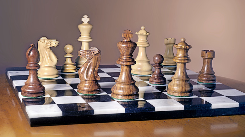 marble chess set with wooden pieces