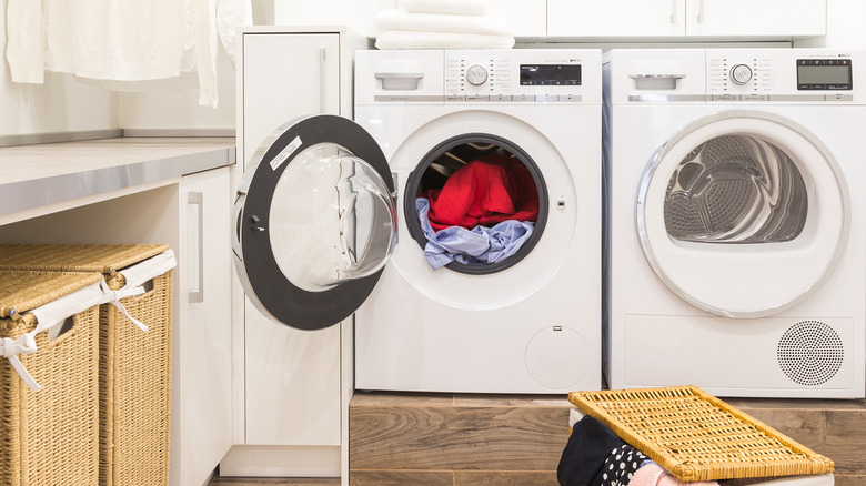 laundry room with hamper storage