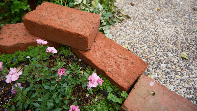 Bricks stacked around garden bed