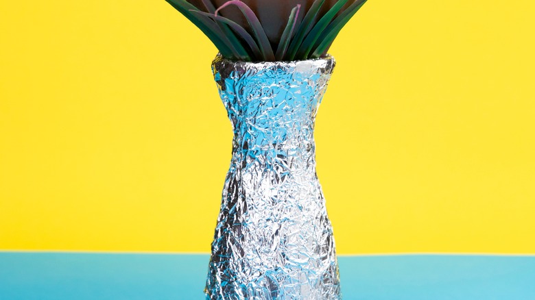 aluminum foil-wrapped vase