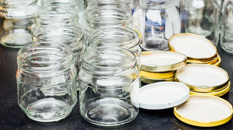 mason jars and lids on table