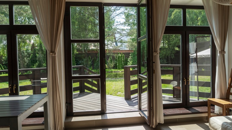 View of garden through large glass doors