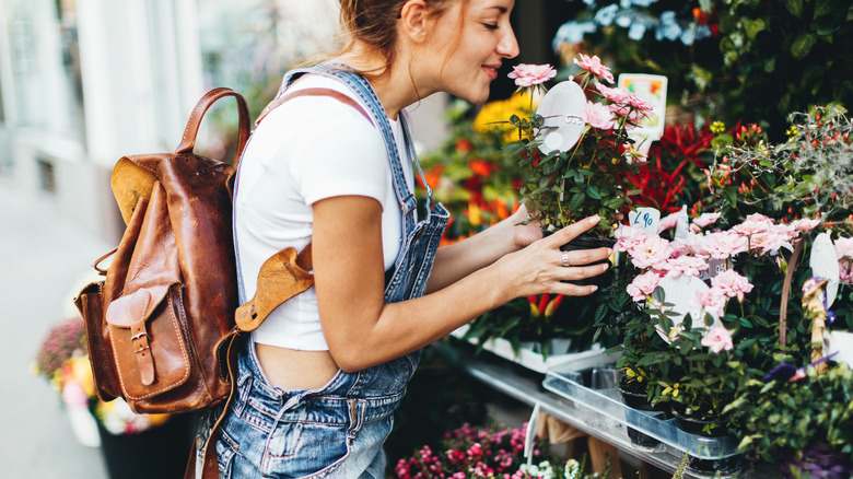 Woman shops for plants