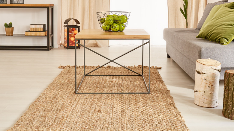 metal-legged table on carpet