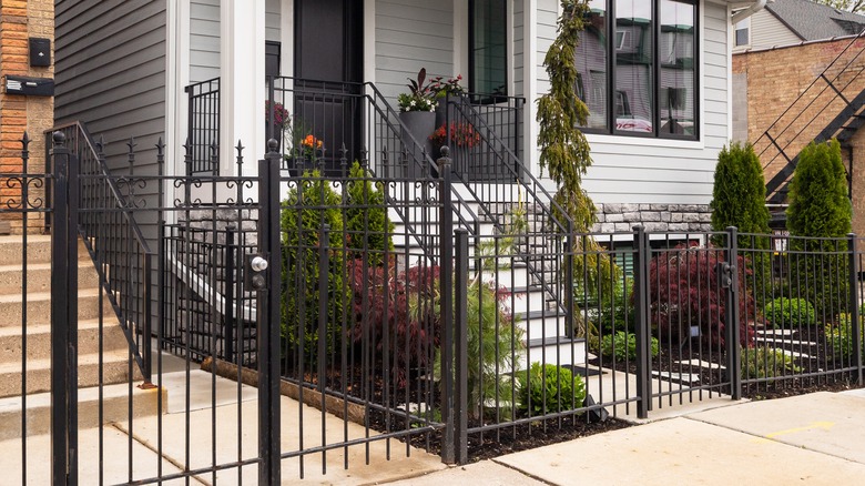 house with wrought iron gate