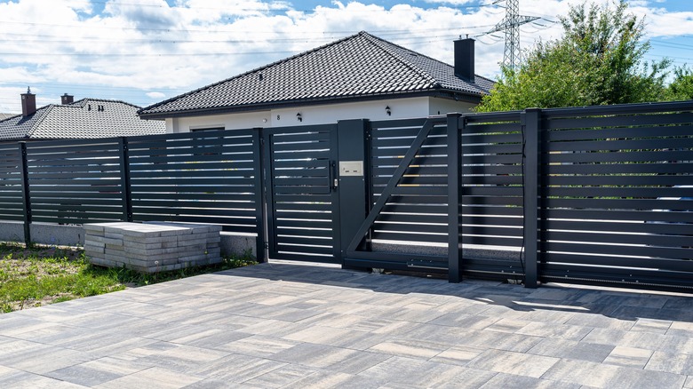 home with horizontal panel fence