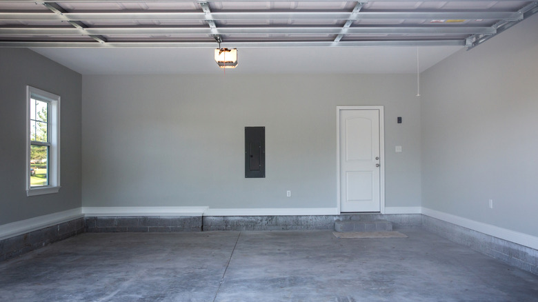 Empty garage with concrete flooring