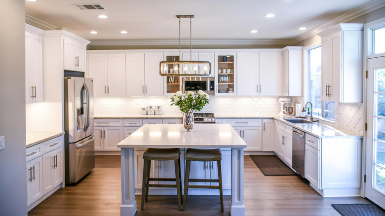 New white modern kitchen with stainless steel appliances