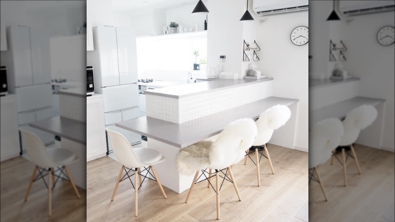 Kitchen with sheepskin chair covers