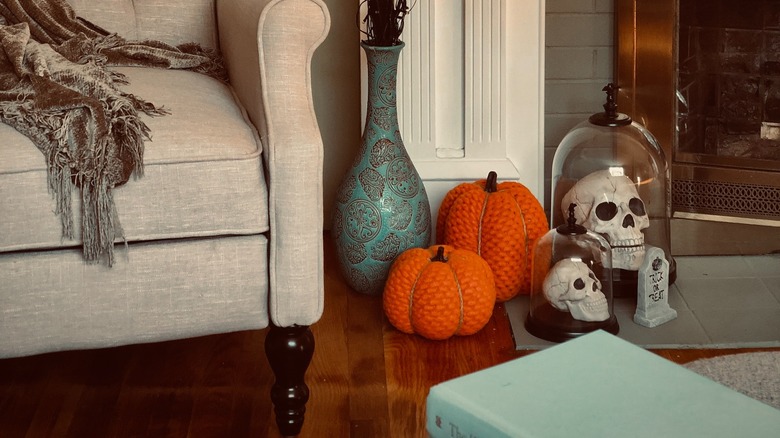 knitted pumpkins on a floor