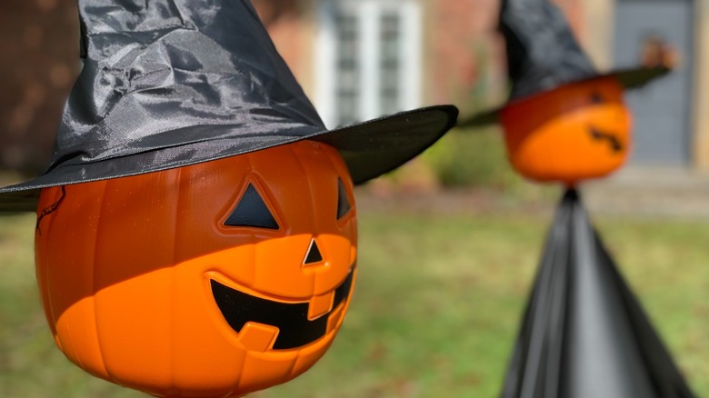 witch hats on pumpkins