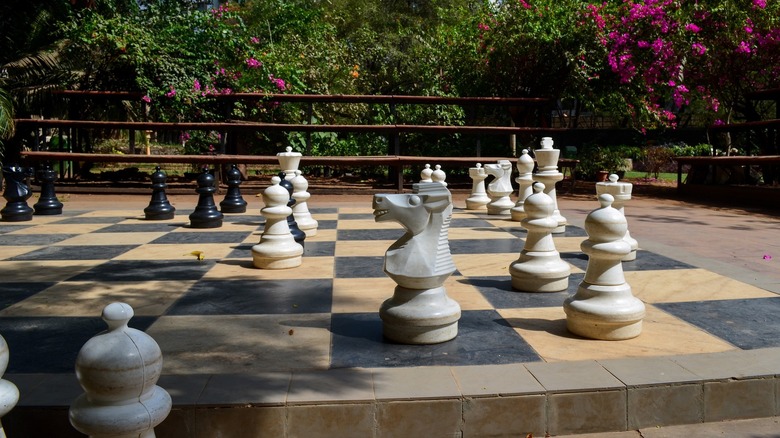 outdoor chessboard in a garden
