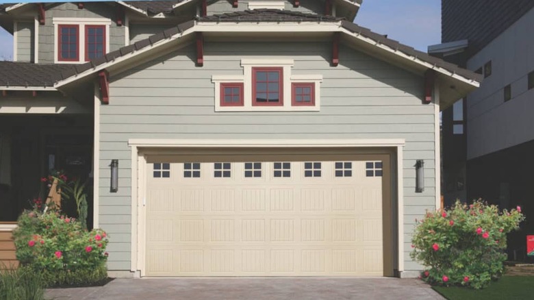 A house with an Overhead Door garage door