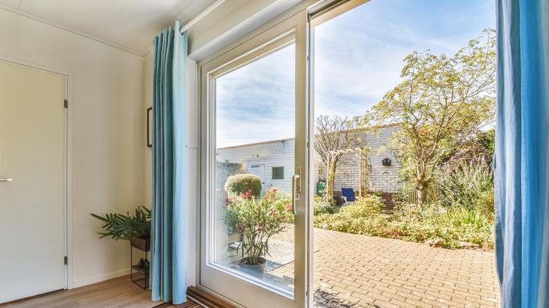 Room with blue drapes