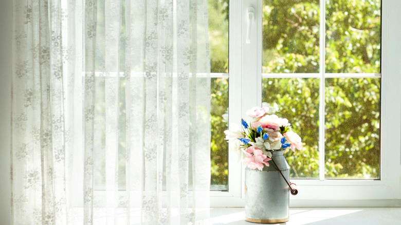 lacy curtains on window