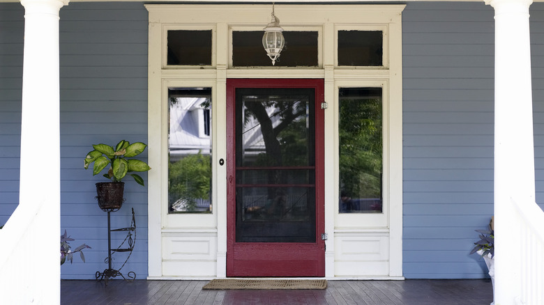 front porch with red door