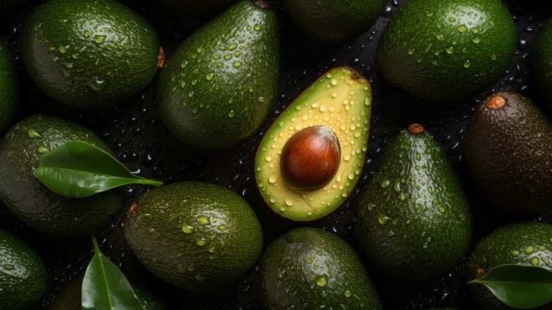 Avocados with water droplets