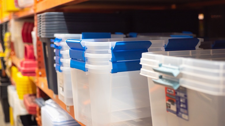 Row of plastic storage totes at store