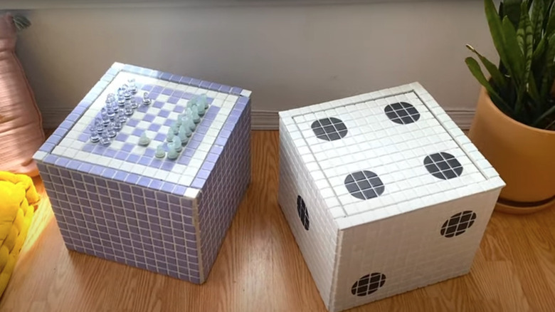 Tiled game storage boxes with dice and chess board patterns