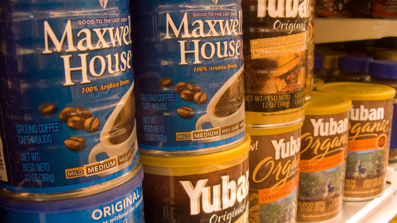 Coffee cans on store shelves