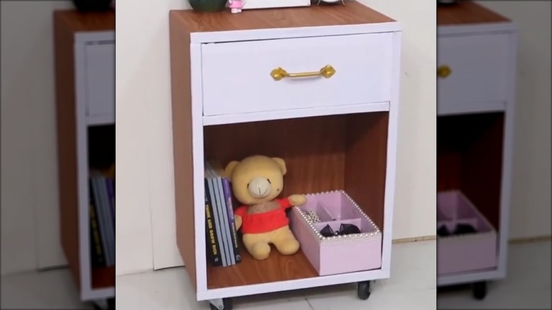 Side table with a drawer made from cardboard that looks like wood