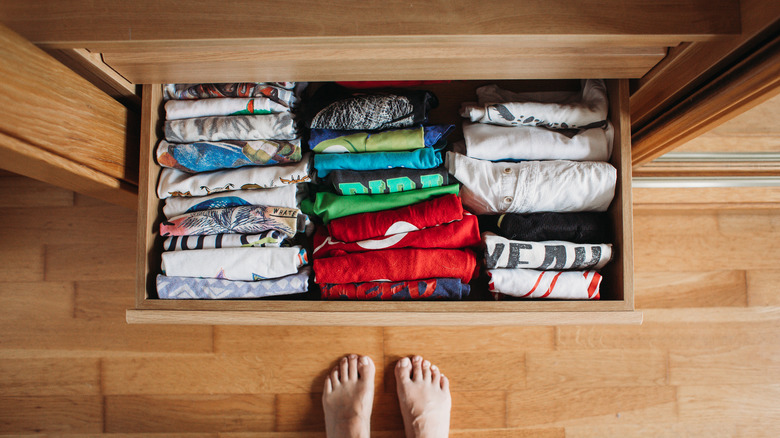 drawer full of colored shirts