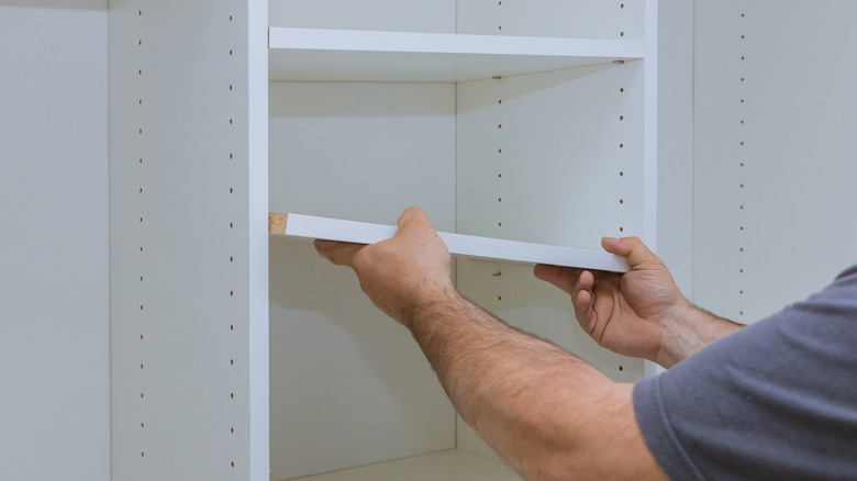 adjusting book shelf