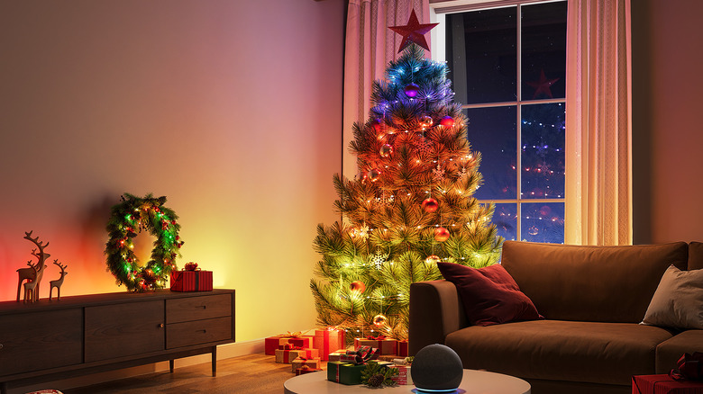 Living room with Christmas tree illuminated with warm light