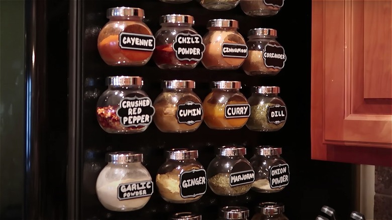 Magnetic spice jars on fridge