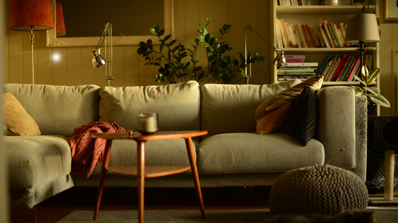 dark living room with floor lamps