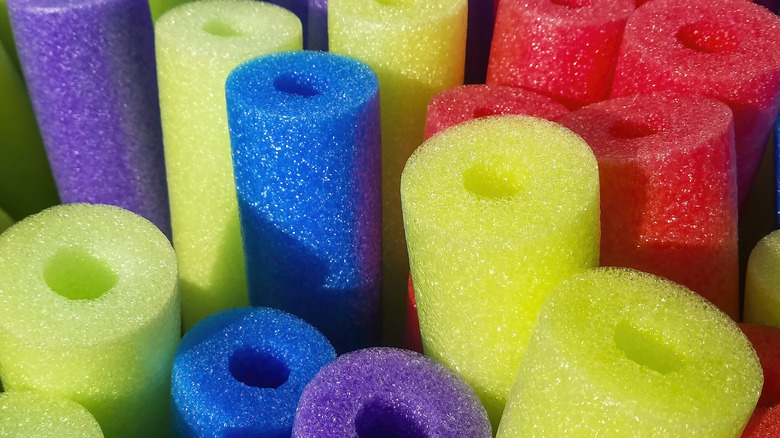 Group of colored pool noodles