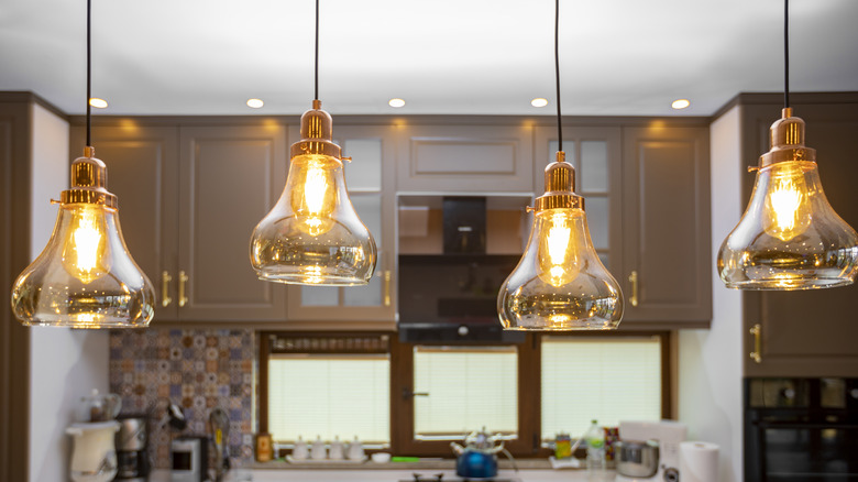 four hanging kitchen pendant lights