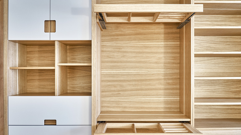 closet with wooden shelves