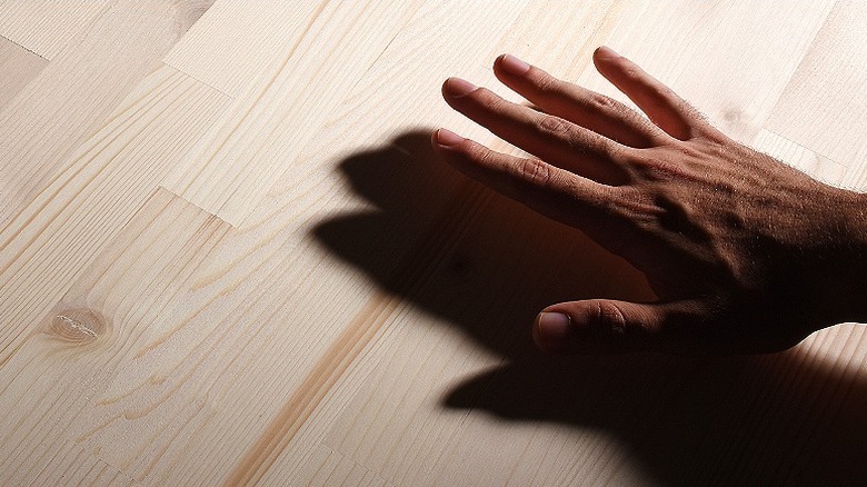 Hand shadow on table