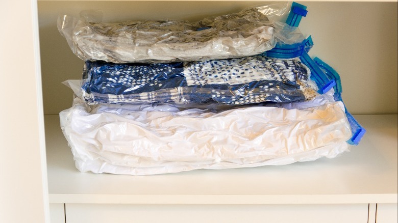 clothes and duvets in vacuum sealed bags