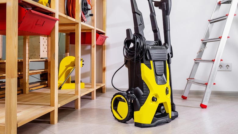 Pressure washer sits on garage floor