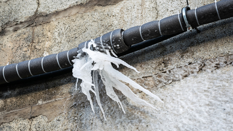 Ice escaping from a bursted pipe