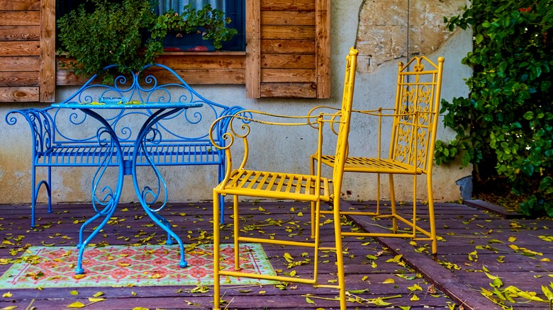 blue and yellow outdoor dining set 