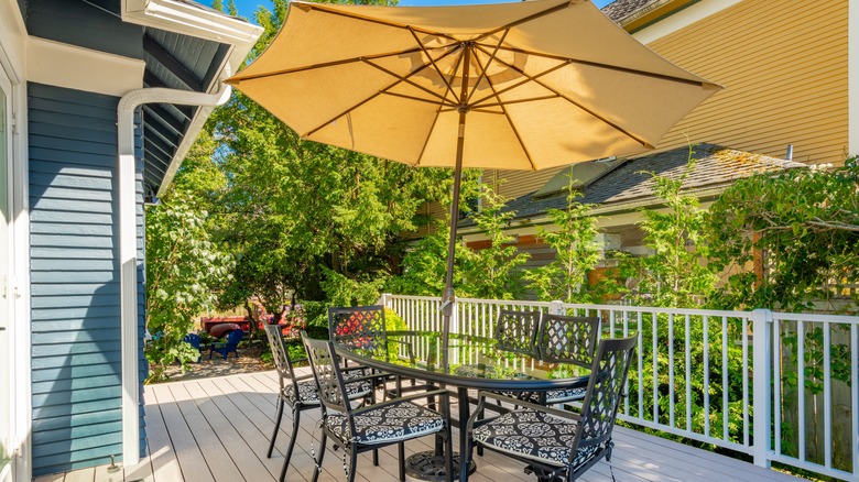 metal patio table with umbrella