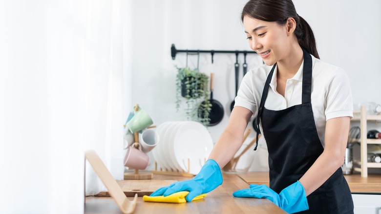 Woman cleaning house