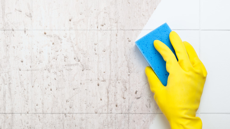 Cleaning dirty tile wall