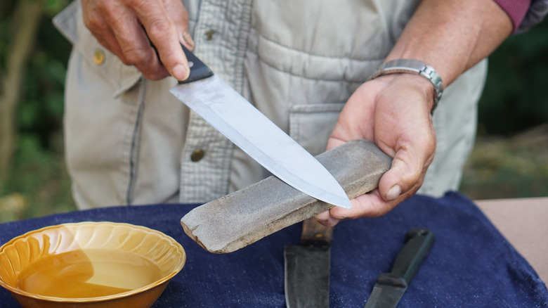 Kitchen knife sharpening using a whetstone