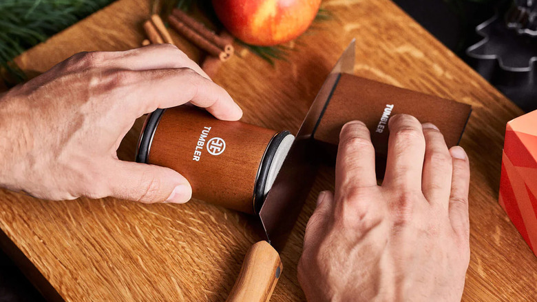 The Original Tumbler Rolling Knife Sharpener being demonstrated